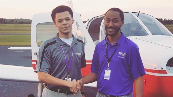 Full circle in motion: Ricardo Astillero, who once found his own path through mentorship, now flies for American Airlines and lifts the next generation. Here he congratulates Nick Robinson, who earned his private pilot certificate in just 41 hours and now flies for Delta Air Lines. Photo courtesy of Ricardo Astillero.